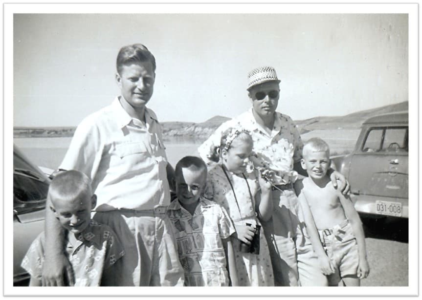 Vintage family photo by the water